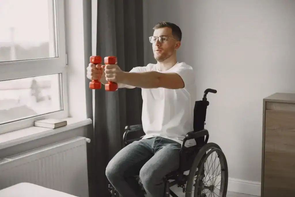 Empowering Weight Loss: A Comprehensive Guide for Individuals with Disabilities 1 Image of man doing exercise in his wheelchair to aid weight loss Walton on the Hill