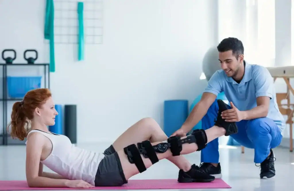 Debunking Meal Timing Myths: The Truth About Muscle Recovery 1 Woman having treatment to help muscle recovery Walton on the Hill after an injury