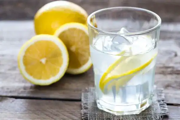 Hydration: The Secret Ingredient for a Toned Stomach and Enhanced Fitness 2 Image of lemon water to aid hydration Walton on the Hill