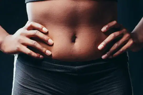 Toning Your Stomach: The Ultimate Guide to Achieving a Sculpted Stomach While Shedding Pounds 1 Image of a toned stomach after non surgical treatment Walton on the Hill